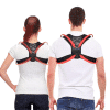 Two people wearing Fit Peak posture correctors with their backs turned