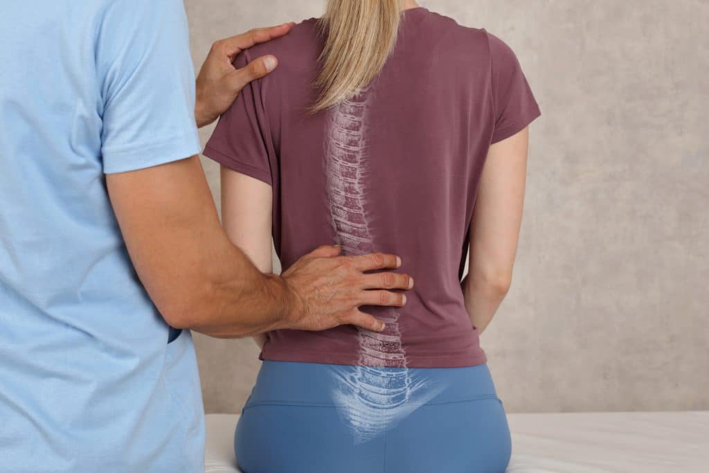 Person having posture checked to help their posture at home.