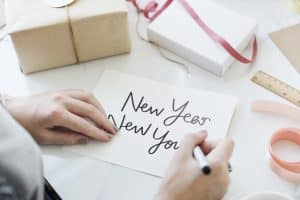 Person Writing New Year New You On A Card